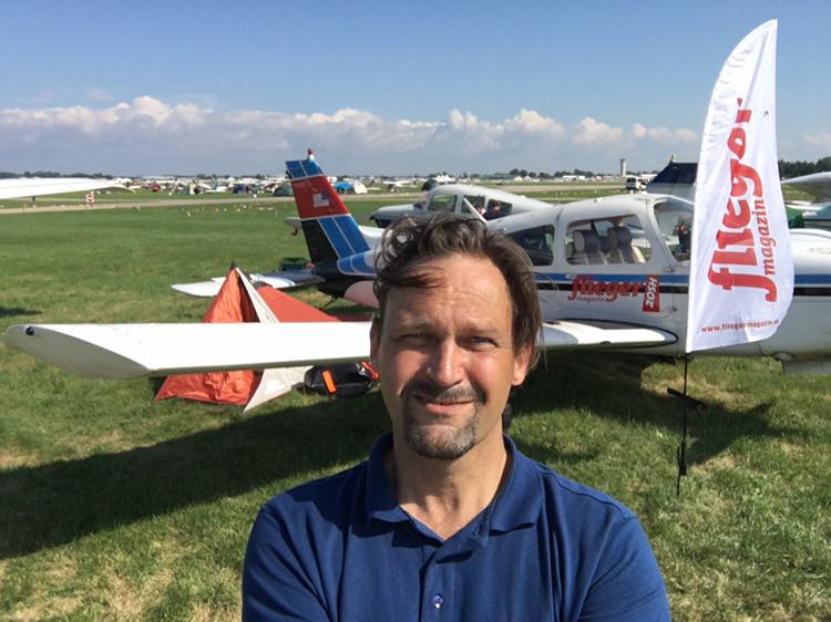 Christof Brenner an seinem Parkplatz beim AirVenture 2018